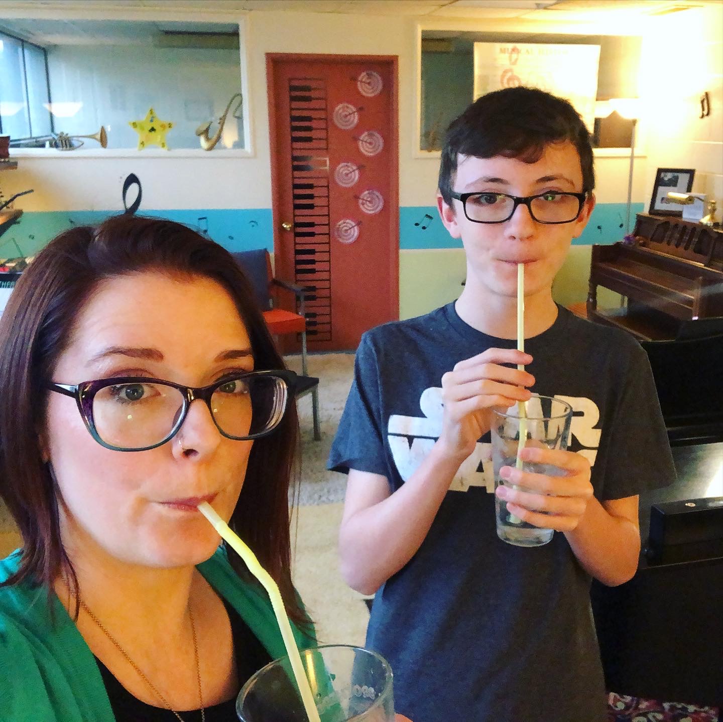 Emmet and Sara doing SOVT straw exercises during musical theatre tech week
